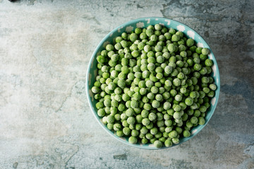 frozen green peas in a bowl