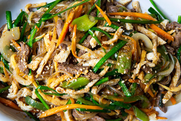 Stir fried Korean glass noodle with soy sauce called Japchae