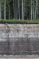 View on the wall of the open air mine showing the limestone and oil shale sedimentation layers,...