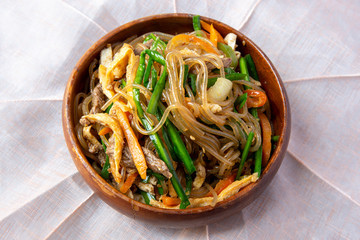 Stir fried Korean glass noodle with soy sauce called Japchae