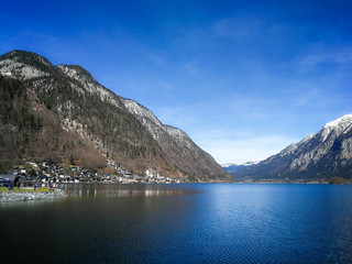 Historic town with salt mine at the top of the mountain, Hallstatt, Austria. View at the Hallstatt lake. 