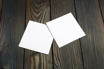 Two square blank cards (business cards, tickets, flyers, invitations, coupons, banknotes, etc.) on...