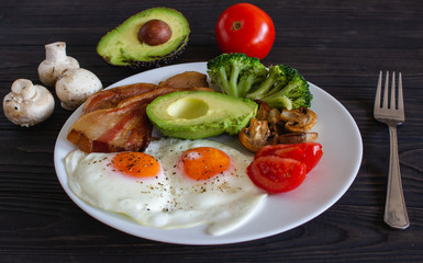 Ketogenic diet breakfast closeup on brown table.