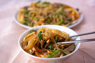 Stir fried Korean glass noodle with soy sauce called Japchae