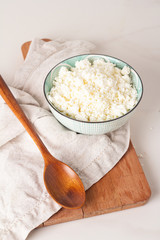 cottage cheese in a cup on the table
