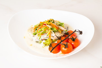 fish with avocado sauce and salad