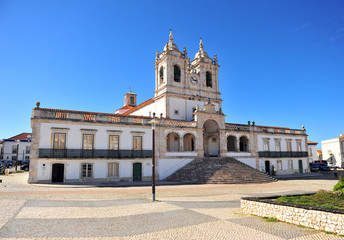 Fototapeta na wymiar Front view of Nazare cathedral on the main square