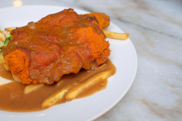 Chicken chop with  french fried and vegetable
