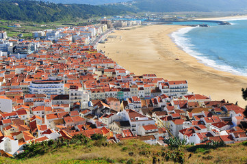 top view of Nazare town and sand beach