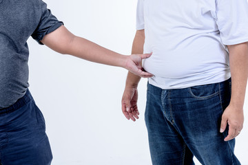 Fat men use their hands to grind the belly fat of their friends On white background, concept to health care of people and obesity