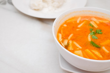 Photo of Seafood Tomyam soup in the white bowl - Thai food