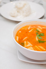 Photo of Seafood Tomyam soup in the white bowl - Thai food