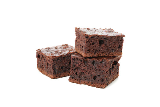 Heap of delicious chocolate cake slices isolated on white background