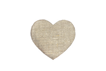 flax fabric heart on a white isolated background. Stock photo for the day of St. Valentine with empty space for your text. For web, print, postcards and wallpaper.
