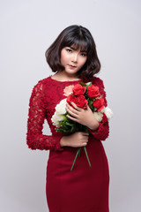 Beautiful lady wear  red dress. With rose in many color. There are red,white and pink rose for tell love someone,special day, Valentine's day.