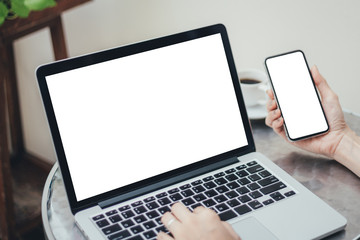 mockup image blank screen computer,cell phone with white background for advertising text,hand man using laptop texting mobile contact business search information on desk in office.marketing,design