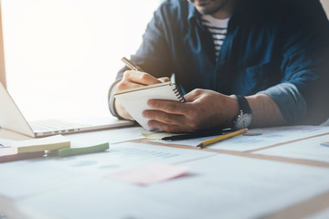 contact marketing businessman professional people thinking while working writing information documents in home offices at desk with computer,laptop,cell phone,business report chart
