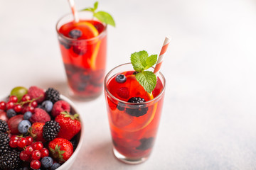 Fresh summer berry drink with lemon and mint.