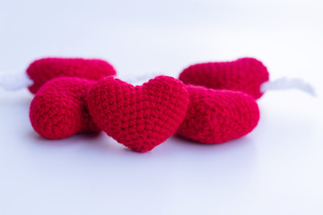 Beautiful red heart on a natural bokeh background. Valentine's Day .