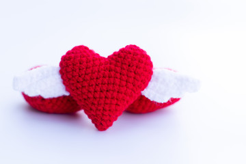 Beautiful red heart on a natural bokeh background. Valentine's Day .