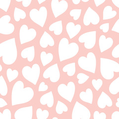 Fototapeta na wymiar Cute white hearts seamless pattern for Valentine's Day on pale pink background. Flat style. Minimalist and simple.