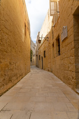 tiny narrow empty street in Mdina