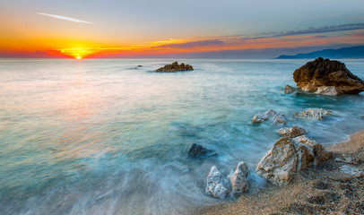 Long exposure image of dramatic sky with rock in sunset - Alanya, Antalya