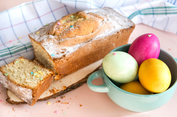 boiled Easter eggs and Easter cupcake on towel