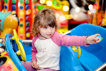 cute little girl at a fun fair