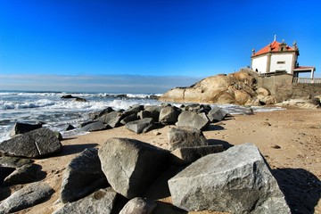 Beautiful chapel in the sea called Senhor da Pedra in Porto