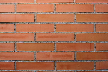 Fondo con una pared o muro de ladrillo rojo típico de España y Europa