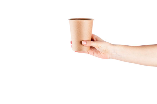 Mockup of woman hand holding a Coffee paper cup isolated on white background.