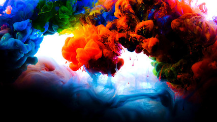 Color paint drops in water , abstract color mix , drop of Ink color mix paint falling on water Colorful ink in water, 