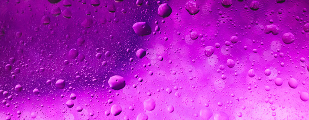 A bubbles is a small column of liquid, bounded completely. Abstract background purple  trend color 2020. Selective focus