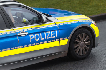 modern german police car on the road - obrazy, fototapety, plakaty