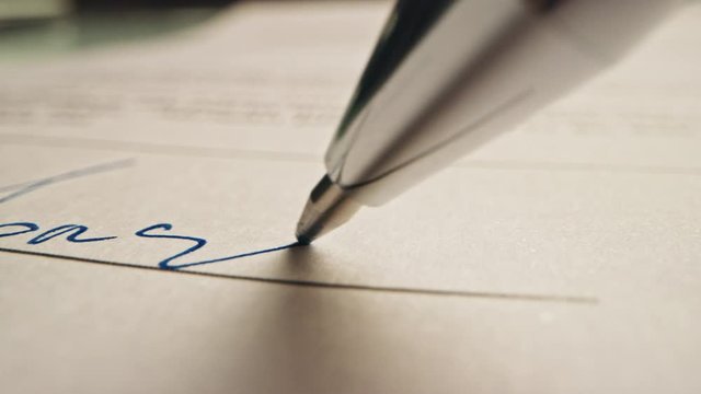 Person Signing Important Document. Camera Following Tip of the Pen as it Signs Crucial Business Contract. Mock-up "Lorem Ipsum" Signature Made on the Template Document. Macro Close-up Shot