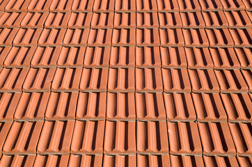 Obraz na płótnie Canvas New roof with ceramic tiles closeup