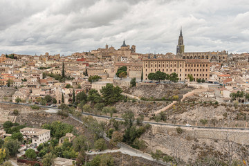 Fototapeta na wymiar Majestic view of the city of Toledo, Spain. Panoramic cityscape of the old city of Toledo in Spain