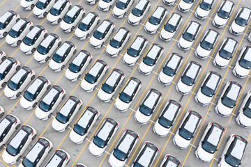 Top view of row new cars in logistic port export terminal
