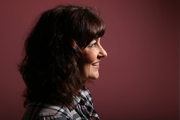 Beautiful woman in front of a background