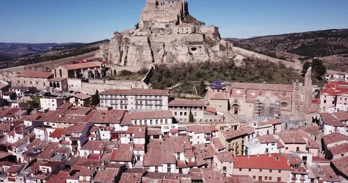 Aerial view of medieval fortified Castle of Morella on rocky hilltop, Castellon, Spain