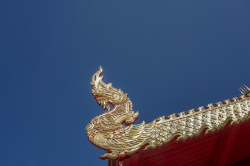Hand crafted 'Naga' on the roof