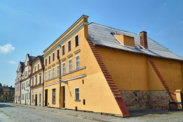 Fototapeta na wymiar historic tenement houses on a cobblestone street of the city of Vidnava in the Czech Republic.