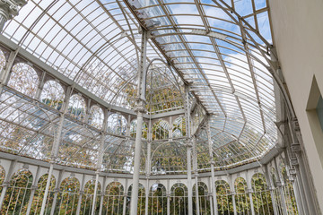 Iron and glass house construction.  Large roof made of Iron and glass materials
