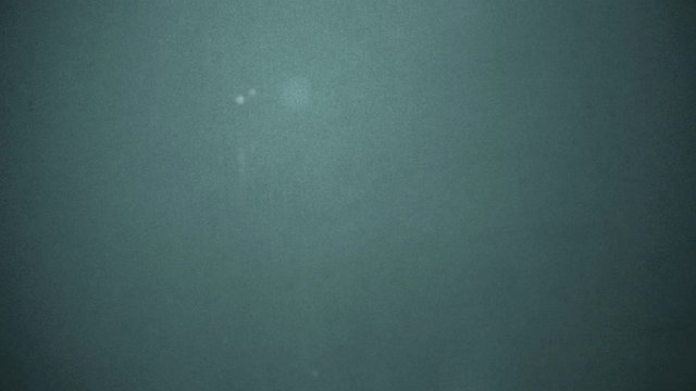 Vintage grunge video with dust grain texture overlay effects for film with space for text or image