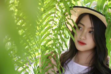 Portrait Asian thai cute teen woman girl long hair. Face focus selected and blurred natural background.