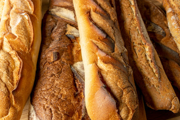 French baguettes. Fresh crisp bread. Bread background.