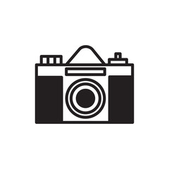 Vector retro camera icon. Flat illustration of film retro camera isolated on white background. Icon vector illustration sign symbol.