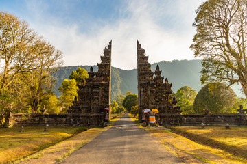 Amazing view of Handara gate in the morning with the mist over mountains in Bali, Indonesia.