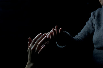 Granddaughter holds hand of her grandmother. Good palm of grandmother and granddaughter